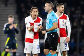Croatia's Luka Modric complains to referee Orel Grinfeeld after the red card for Petar Sucic during the 1-0 defeat to Scotland at Hampden. (Photo by Alan Harvey / SNS Group)
