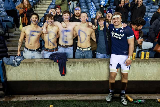 Scotland debutant Freddy Douglas with family and friends at full time after the win over Portugal. (Photo by Ross MacDonald / SNS Group)