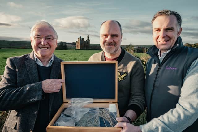 L-R: James Brown, Angelo Ovidi and Nicholas Howie (from Lindsays) pose for a photo at Baltersan Castle.  Picture: Jamie Simpson/Lindsays