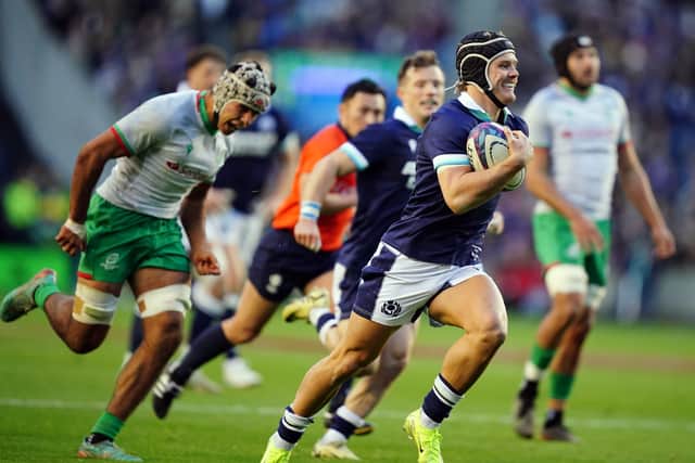 Darcy Graham breaks free to score Scotland's fourth try against Portugal and equal the national side's try record.