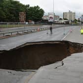 A sink hole, rather than a pothole, but it helps make a point about the need to keep roads and pavements in a good state of repair (Picture: Christopher Furlong)