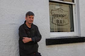 Crime writer Ian Rankin outside The Oxford Bar in Edinburgh, which features in his Rebus novels
