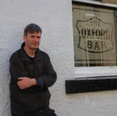 Crime writer Ian Rankin outside The Oxford Bar in Edinburgh, which features in his Rebus novels