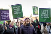 Supporters of For Women Scotland and the Scottish Feminist Network take part in a demonstration outside the Scottish Parliament (Picture: Lesley Martin)