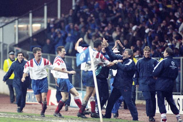 Scott Nisbet (2) takes the acclaim from Archie Knox and the Rangers players after scoring with a fortuitous effort against Club Brugge in 1993.