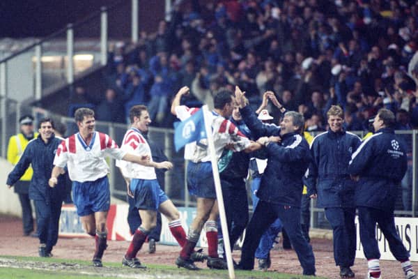 Scott Nisbet (2) takes the acclaim from Archie Knox and the Rangers players after scoring with a fortuitous effort against Club Brugge in 1993.