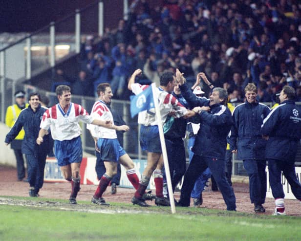 Scott Nisbet (2) takes the acclaim from Archie Knox and the Rangers players after scoring with a fortuitous effort against Club Brugge in 1993.