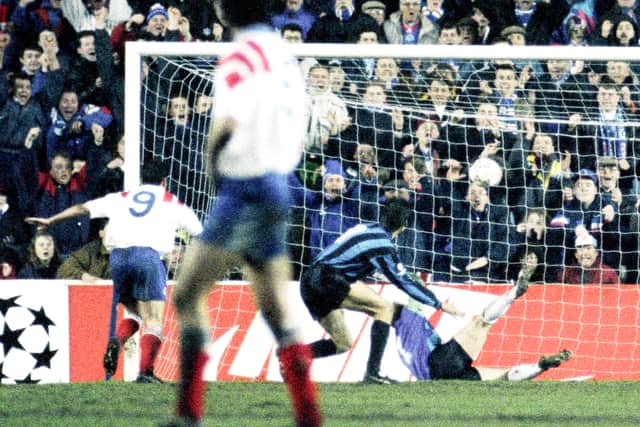 Rangers striker Ally McCoist (left) celebrates Scott Nisbet's (not shown) goal against Club Brugge.