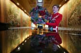 House Steward Joe Mackie in The Tapestry Room as finishing touches are made to Christmas decorations at Dumfries House, which is part of The King's Foundation near Cumnock, Ayrshire