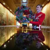 House Steward Joe Mackie in The Tapestry Room as finishing touches are made to Christmas decorations at Dumfries House, which is part of The King's Foundation near Cumnock, Ayrshire