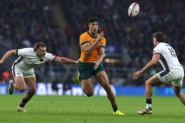 Joseph-Aukuso Suaalii shows off his offloading skills in Australia's win over England.