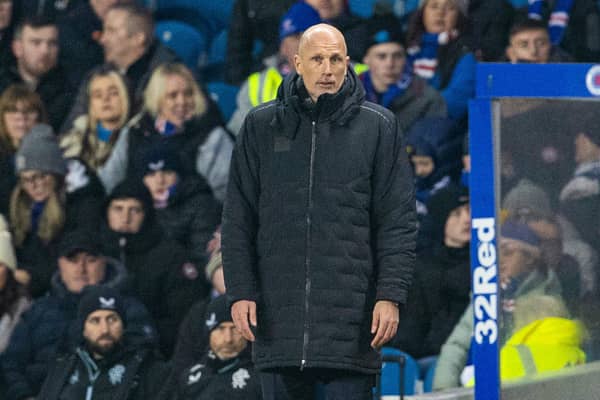Rangers manager Philippe Clement watches on.