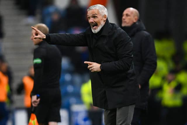 Dundee United manager Jim Goodwin was delighted with a point.
