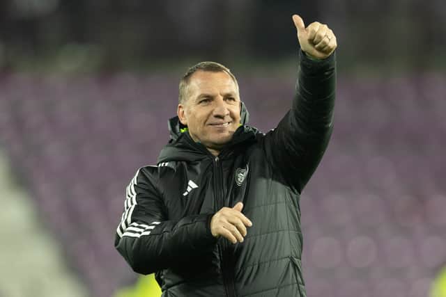 Celtic manager Brendan Rodgers salutes the fan after beating Hearts.