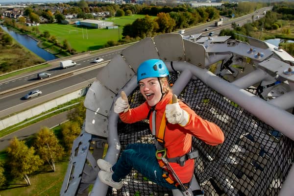 Climbers will ascend to the mouth of one of the Kelpies.