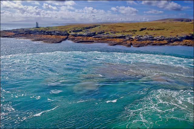 The main harbour and lighthouse at Scalasaig, the main settlement on Colonsay where the new affordable homes will be built. PIC: CC/dun-deagh
