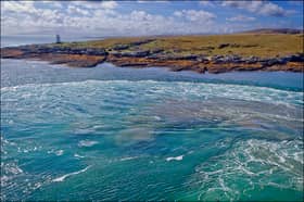 The main harbour and lighthouse at Scalasaig, the main settlement on Colonsay where the new affordable homes will be built. PIC: CC/dun-deagh