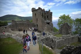 Tourists at Urquhart Castle on the banks of Loch Ness. PIC: Getty/Andy Buchanan.