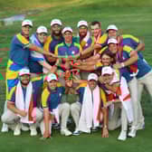 European captain Luke Donald celebrates with his players after winning the 2023 Ryder Cup in Rome.