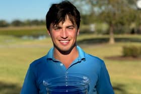 Sam Mukherjee shows off the trophy after winning the Sunshine State Men’s Amateur Championship in Florida