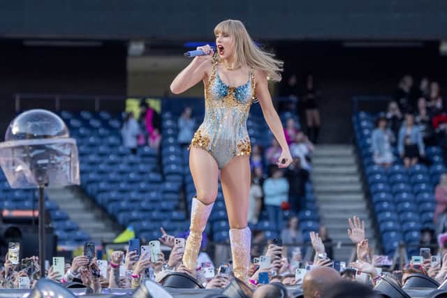 Taylor Swift performing during her Eras Tour at Murrayfield Stadium.