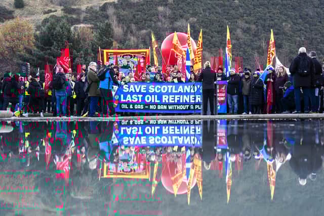 Unite the Union protesting against the closure of the Grangemouth oil refinery outside the Scottish Parliament.