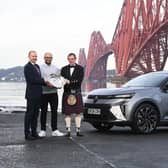Andrew Currie, Renault Franchise Manager, Arnold Clark, Aidan Chesters, Scenic Product Manager, Renault UK, and Alisdair Suttie, President ASMW celebrating the win by the Forth Bridge with the Renault E-Scenic