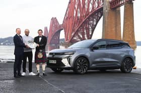 Andrew Currie, Renault Franchise Manager, Arnold Clark, Aidan Chesters, Scenic Product Manager, Renault UK, and Alisdair Suttie, President ASMW celebrating the win by the Forth Bridge with the Renault E-Scenic