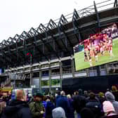 Fans watch the Wales v Fiji on the big screen outside the stadium before Scotland v South Africa. John McGuigan wants supporters to 'come earlier and leave later'.
