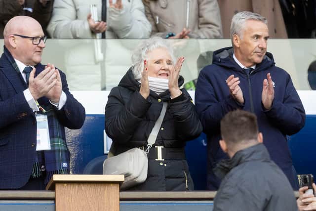 Scottish Rugby chair John McGuigan, right, with outgoing SRU president Colin Rigby, and Sione Tuipulotu's grandmother, Jaqueline Thomson.