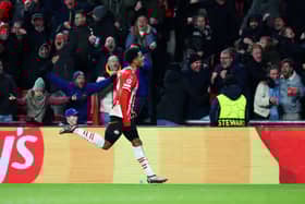 Malik Tillman of PSV Eindhoven celebrates scoring his team's second goal during the UEFA Champions League 2024/25 League Phase MD5 match between PSV Eindhoven and FC Shakhtar Donetsk. Cr: Getty Images.