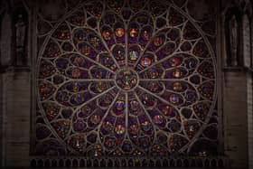 The South Rose window of Notre-Dame de Paris cathedral illuminated just a few days before the cathedral's reopening. Picture: Kiran Ridley/AFP via Getty Images