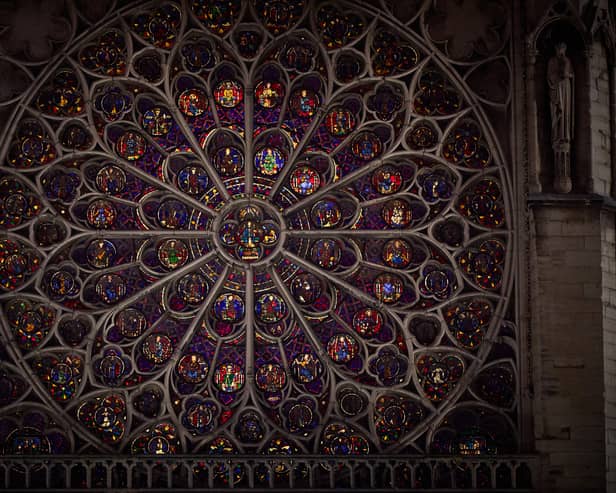 The South Rose window of Notre-Dame de Paris cathedral illuminated just a few days before the cathedral's reopening. Picture: Kiran Ridley/AFP via Getty Images