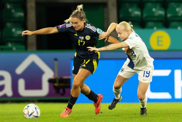 Scotland's Kirsty Smith and Finland's Anni Eveliina Hartikainen battle for possession at Easter Road. Cr: SNS Group.