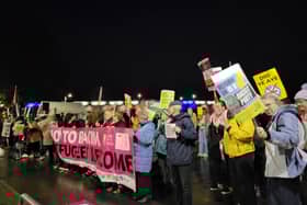 Anti-racist campaigners gathered outside the Reform UK protest.