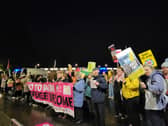 Anti-racist campaigners gathered outside the Reform UK protest.