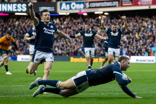 Finn Russell dots down for Scotland in the 27-13 win over Australia.