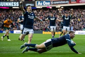 Finn Russell dots down for Scotland in the 27-13 win over Australia.