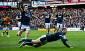 Finn Russell dots down for Scotland in the 27-13 win over Australia.