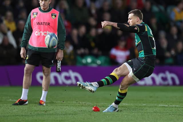 Rory Hutchinson lands a kick for Northampton Saints.