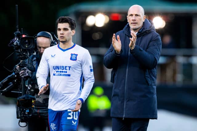 Philippe Clement applauds the Rangers fans afterwards.