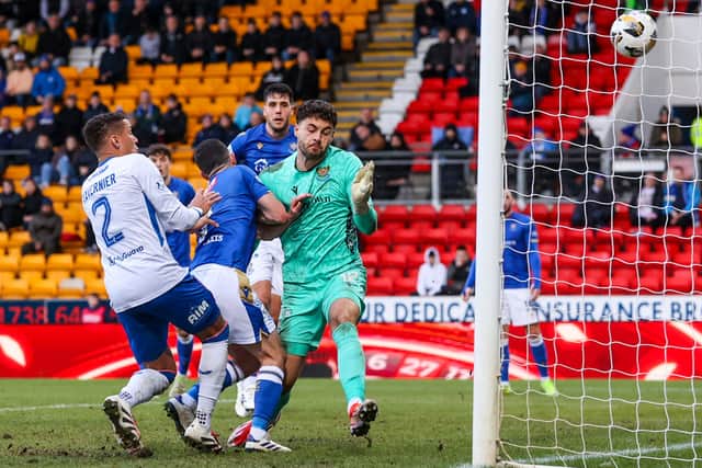 James Tavernier forces Jason Holt into scoring an own goal during the win over St Johnstone.