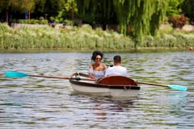 A couple in a boat on the River Thames at Richmond upon Thames, one of the happiest places in Britain, according to Rightmove