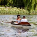 A couple in a boat on the River Thames at Richmond upon Thames, one of the happiest places in Britain, according to Rightmove