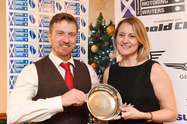 Motoring writer and general manager of The Scotsman Publications Steven Chisholm presents the award for Utility Vehicle of the Year, which was won by the Ford Transit Custom, to Nikki Rooke of Ford