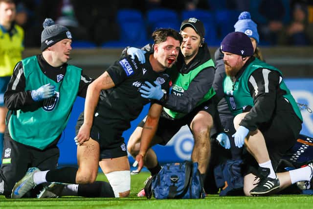 Glasgow's Adam Hastings suffered a broken jaw following a tackle from Scarlets' Vaea Fifita at Scotstoun on Friday. (Photo by Craig Williamson / SNS Group)