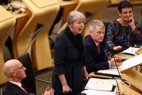 Finance Secretary Shona Robison, flanked by First Minister John Swinney, responds to questions over the Scottish Budget. Picture: Jeff J Mitchell/Getty Images