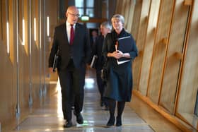 First Minister John Swinney walks alongside Finance Secretary Shona Robison ahead of the Scottish Budget being delivered. Picture: Jeff J Mitchell/Getty Images