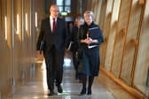 First Minister John Swinney walks alongside Finance Secretary Shona Robison ahead of the Scottish Budget being delivered. Picture: Jeff J Mitchell/Getty Images