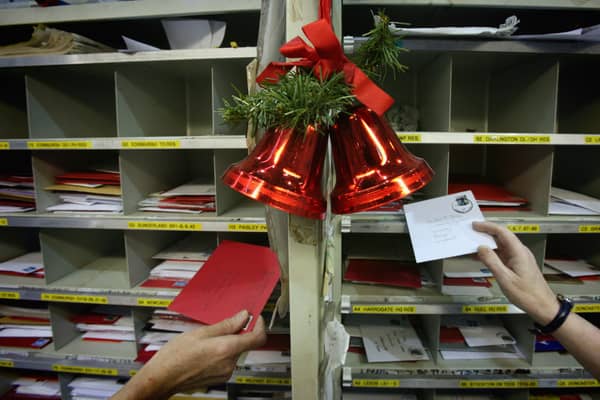 Royal Mail postal workers sort Christmas cards in the Royal Mail Regional Sorting Office in Filton (Photo: Matt Cardy/Getty Images)